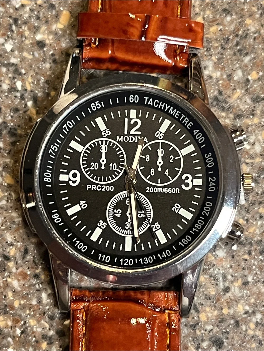 Men’s watch with leather strap